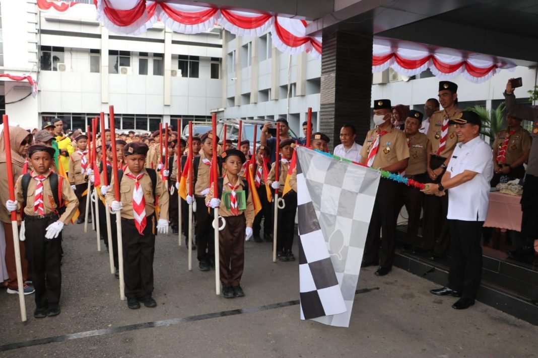 Sambut HUT ke-77 RI, Pj. Bupati Resmikan Lomba Gerak Jalan Pramuka